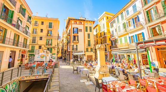 Palma de Mallorca, Spain - 30 August 2021: Old town panoramic view with summer street cafe