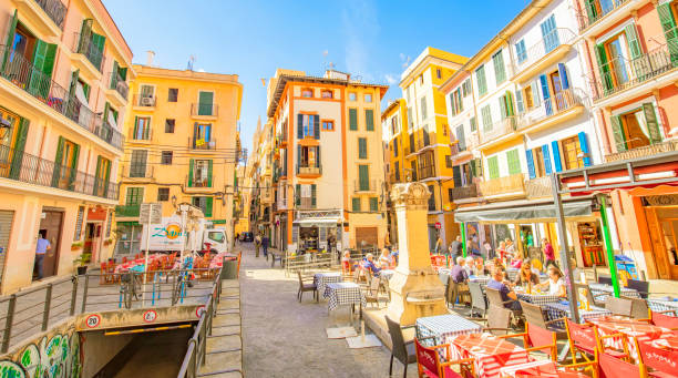 Palma de Mallorca old town, Spain Palma de Mallorca, Spain - 30 August 2021: Old town panoramic view with summer street cafe narrow streets stock pictures, royalty-free photos & images