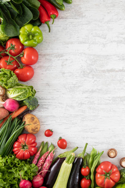 istock Fresh Vegetables on White Wooden Table 1355643726