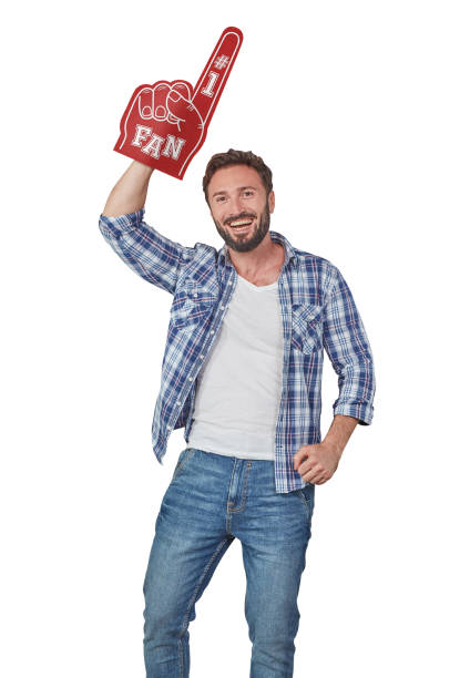istock Cheerful man with fan foam hand 1355643834