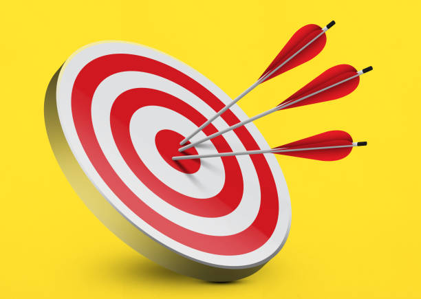 istock Dartboard and arrows on yellow background 1355643866