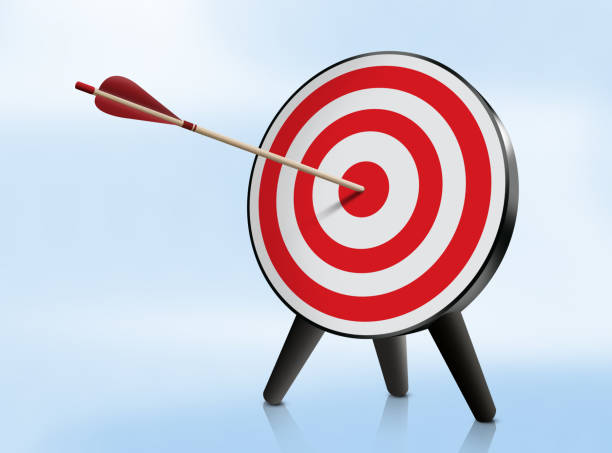 istock Red dartboard and bullseye arrow 1355643921