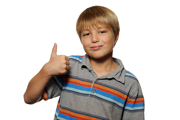 istock Cute Boy Giving Thumbs Up Sign 135564593