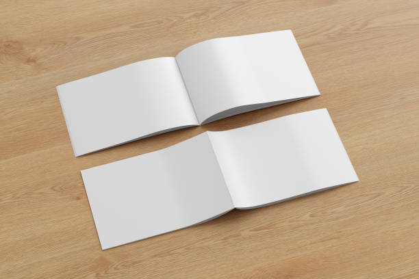 istock Horizontal brochure or booklet mock up on wooden background. 1355649665