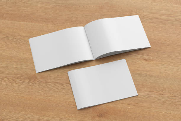 istock Horizontal brochure or booklet mock up on wooden background. 1355650800