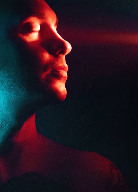 istock Portrait of men neon light 1355652328