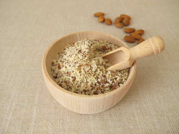 istock Unpeeled ground almonds in a wooden bowl 1355652502