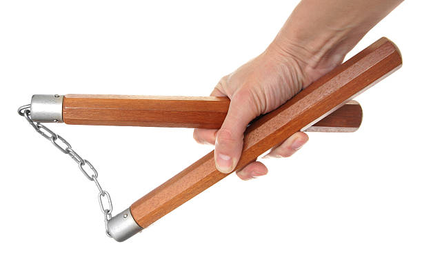 nunchaku em uma mão - nunchaku imagens e fotografias de stock