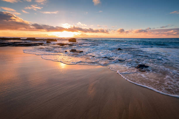 istock sunrise from Sandy Beach, Oahu, Hawaii 1355653315