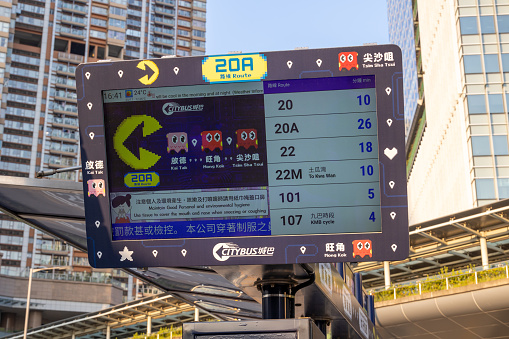 Hong Kong - November 25, 2021 : Electronic display showing the times of next buses in San Po Kong, Kowloon, Hong Kong. It can advise passengers of the estimated arrival time of the next bus at the en route bus-stops.