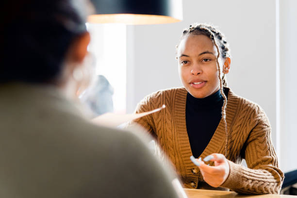 young female applicant at job interview - resume interview recruitment human resources imagens e fotografias de stock