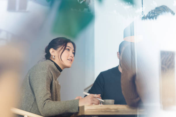 istock Employer interviewing a job applicant inside office boardroom 1355656417