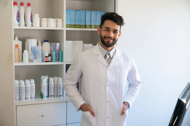 istock Portrait of happy pharmacist 1355658906