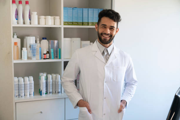 istock Portrait of happy pharmacist 1355658944