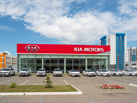 Russia. Barnaul. July 2021. A car dealership Kia Motors in a new neighborhood. Sale and rental of cars.