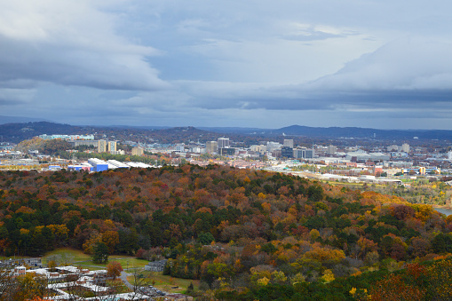 Downtown Chattanooga cityscape and fall foliage from Lookout Mountain during overcast morning