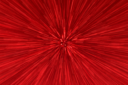 Blurred red zoom perspective background. Abstract soft explosion effect. Centric motion pattern