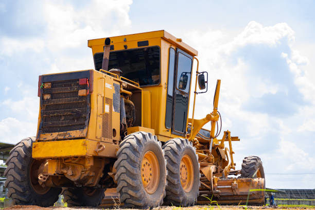 istock The ground grader is adjusting the road surface evenly to the level that engineers have calculated, industrial road construction, using state-of-the-art machinery to work for speed and accuracy 1355666607