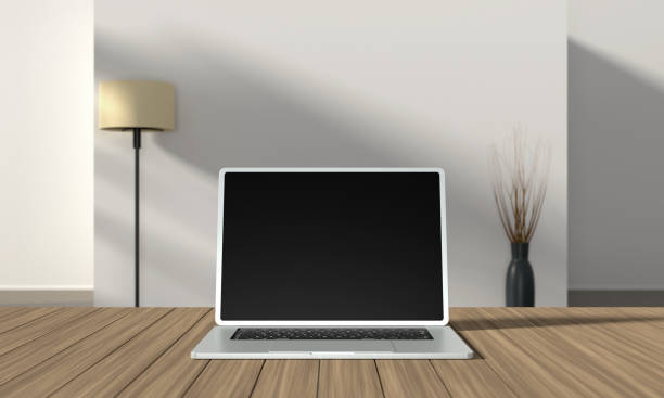 istock Laptop on the table in the room. 1355666614