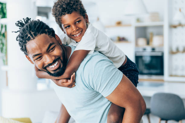 istock Father and little son at home. 1355666700