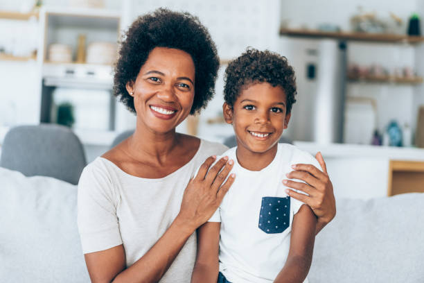 istock Mother and little son at home. 1355666703