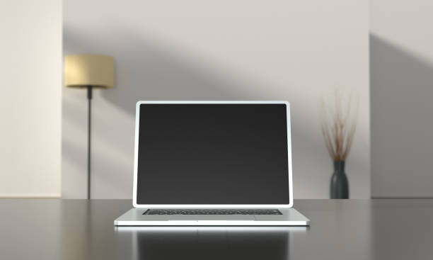 istock Laptop on the table in the room. 1355666772