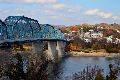 View of blue bridge, river and fall foliage in Chattanooga
