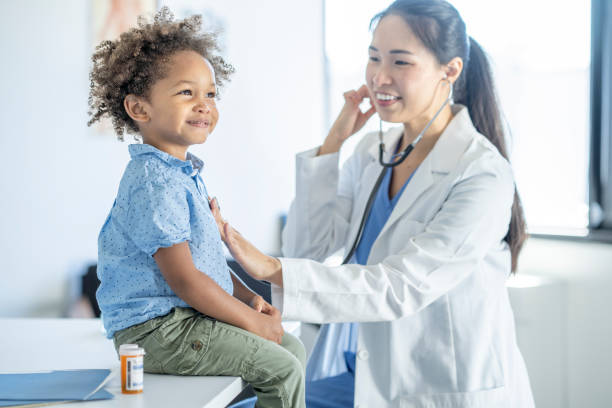 istock Listening to a Little Boys Heart 1355668720