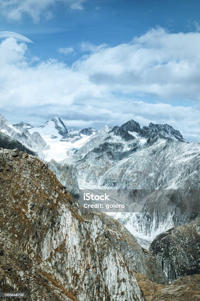 glacier in the swiss alps view into  glacier in the swiss alps under blue sunny sky 2021 Stock Photo