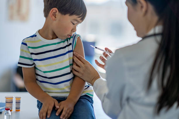 istock Little Boy Receiving a Vaccine 1355668746
