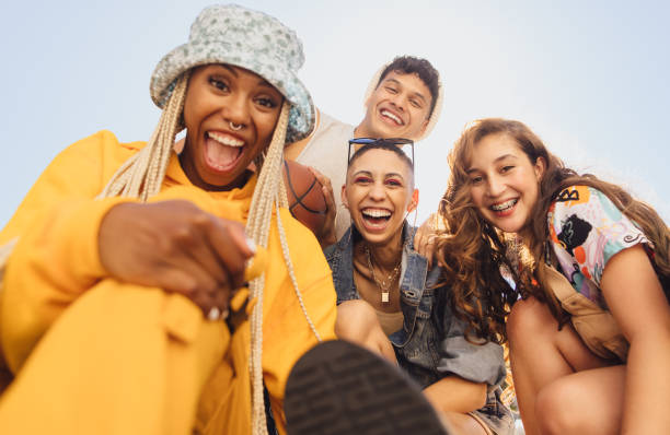 istock Cheerful gen z friends having fun together 1355669926