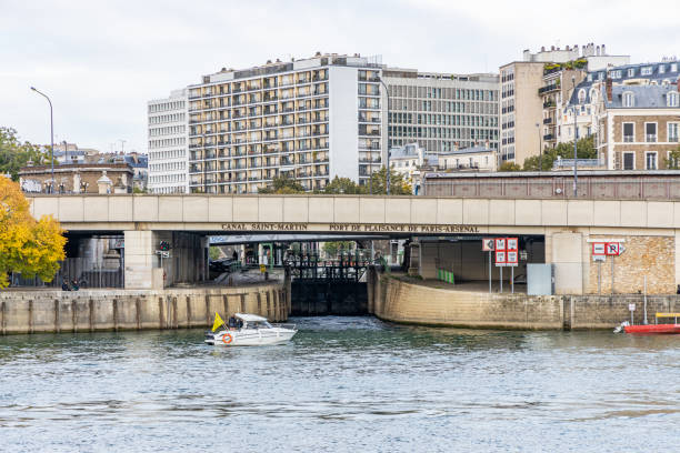 Canal Saint-Martin entrance and lock leading to the Port de l'Arsenal from the river Seine side in Paris, France