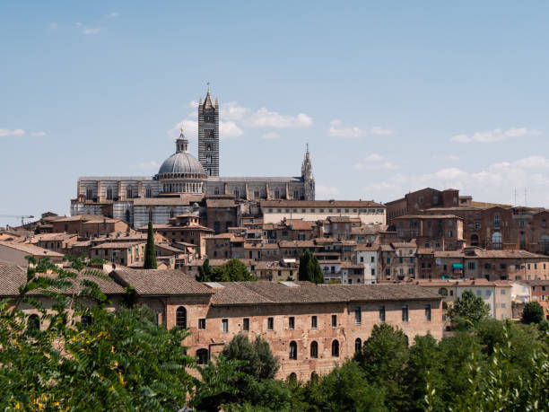 istock Siena Cityscape with Duomo di Siena Cathedral 1355675283