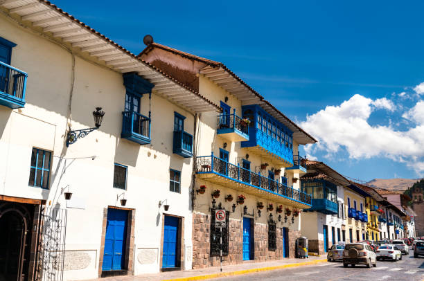 View of Plaza de Armas from balcony in cozy cafe in Cusco during experiential trip in Peru