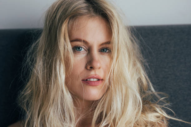 istock A Gorgeous Blonde Woman Looking At Camera 1355681578