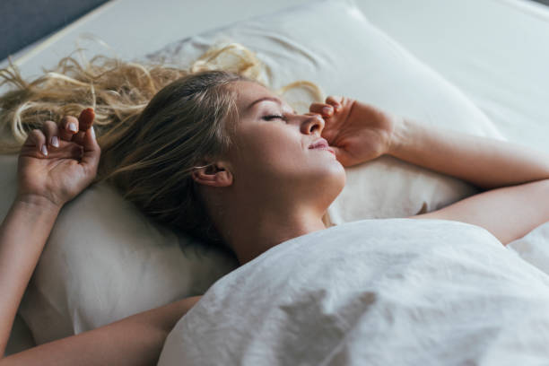 istock A Blonde Woman Sleeping Peacefully 1355681581