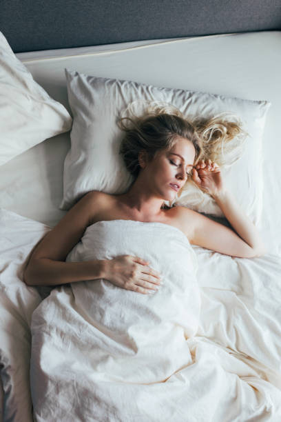 istock A Beautiful Blonde Woman Sleeping Calmly 1355681593