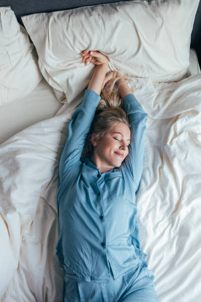 istock A Satisfied Woman Waking Up 1355681653