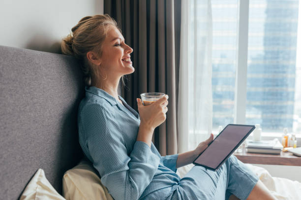 istock A Happy Woman Drinking Her Morning Coffee 1355681659