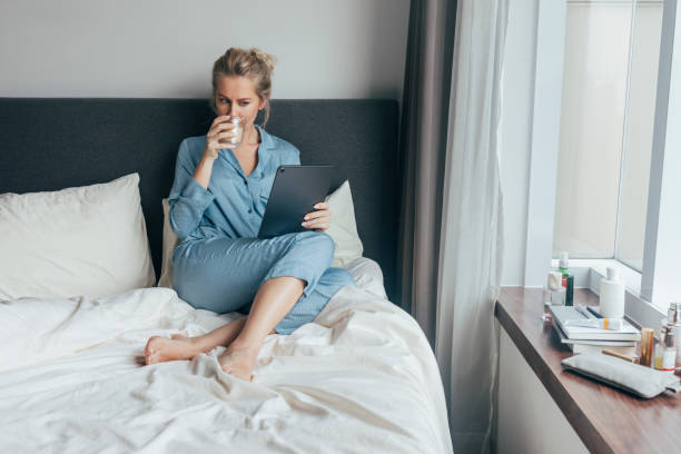 istock A Blonde Woman Drinking Her First Morning Coffee 1355681660