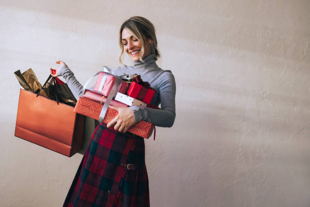 A Beautiful Female Carrying Christmas Presents