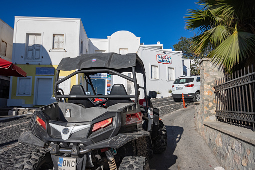 Quad Bike in Pyrgos Kallistis on Santorini in South Aegean Islands, Greece, with visible numberplates