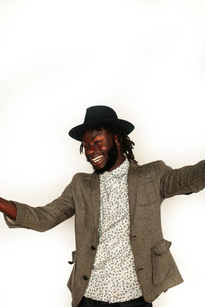 istock young handsome african american man gesturing emotional posing isolated on white background stylish hipster. youth concept 1355684294