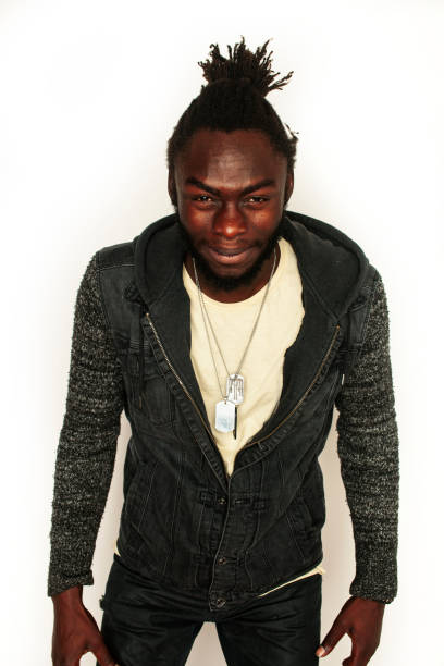 istock young handsome african american man gesturing emotional posing isolated on white background stylish hipster. youth concept 1355684649