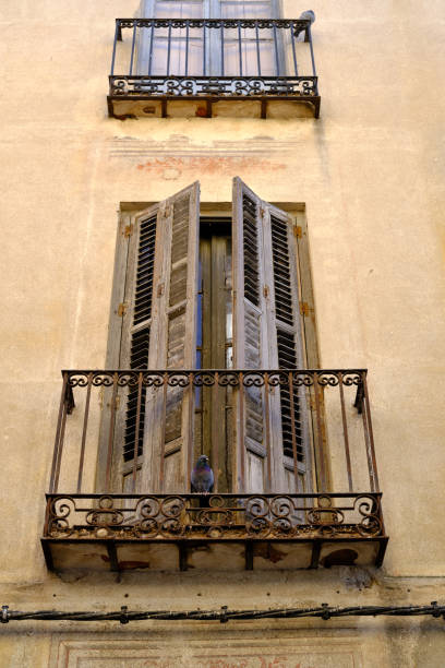 istock Old Mediterranean town house with tall windows 1355685865