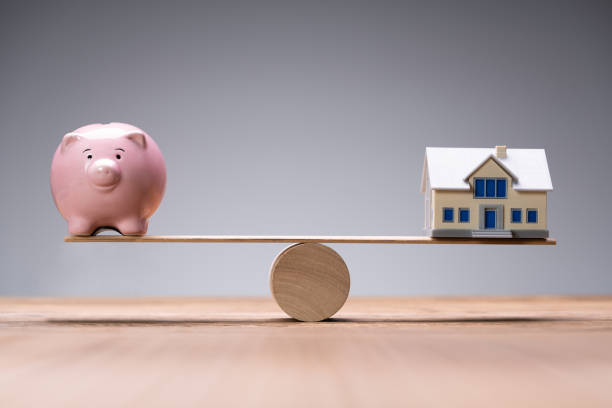 istock Real Estate House Balance 1355687074