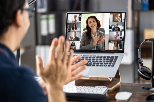istock Man Clapping In Online Video Conference Business 1355687827