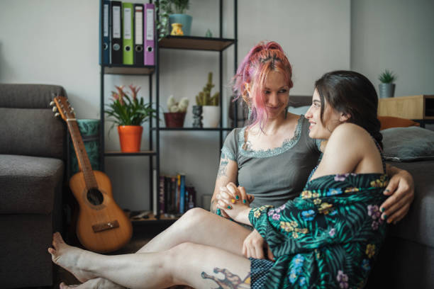 istock LGBTQIA Couple Relaxing At Home 1355688816