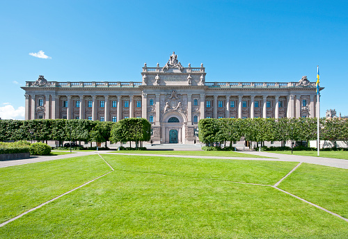 The elegant symmetric gardens and the facade of the Belvedere palace in Vienna, Austria