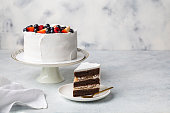 festive white cake decorated fresh beries